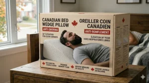 A detailed photorealistic illustration of the premium anti-snoring wedge pillow packaging, designed for Canada. The box features prominent bilingual text in English and French, a red maple leaf logo, and a graphic of a sleeper. The actual quilted pillow is visible inside the open box. High detail, 4K.