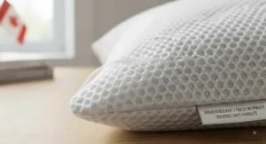 Close-up fabric texture showing the breathable and moisture-wicking material of a top-rated pillow protector.