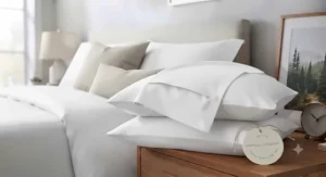 Layered queen size pillowcase set styled with neutral accent pillows in a bright guest bedroom.