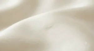 Close-up of the ultra-soft, breathable fabric texture of a bamboo pillowcase.